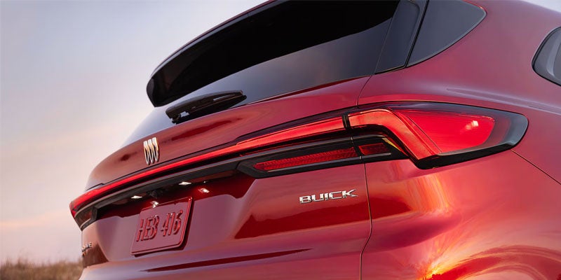 Rear view of red Buick SUV highlighting LED taillights and liftgate design