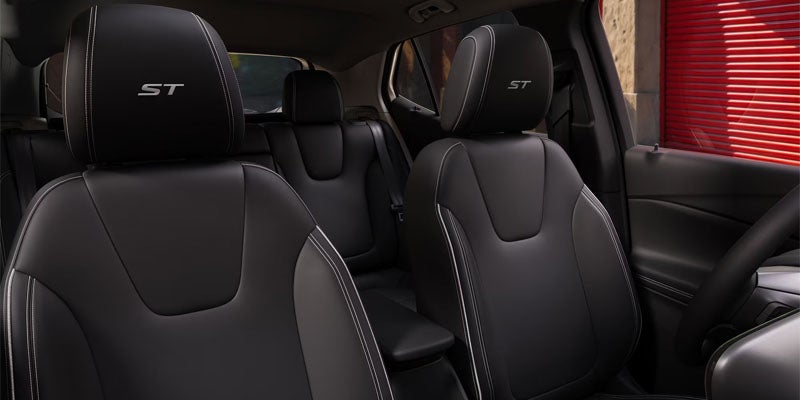 Premium Buick SUV interior featuring black leather front seats