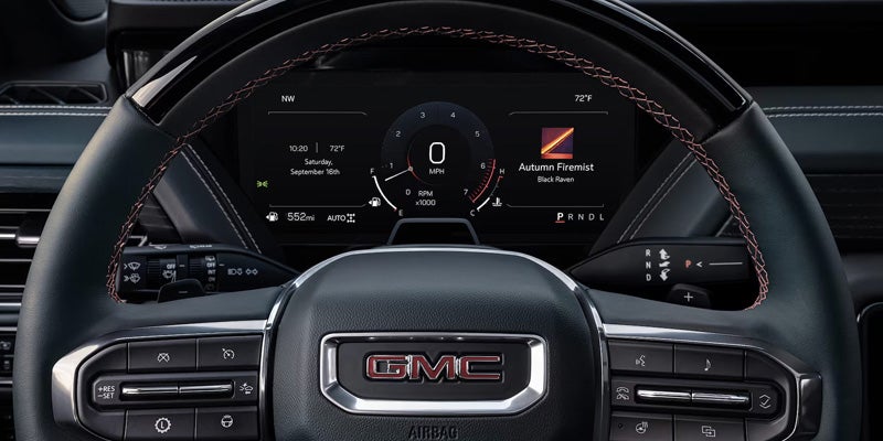 Digital instrument cluster and GMC steering wheel