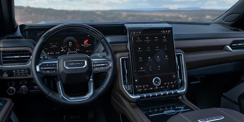Dashboard, steering wheel, and infotainment display
